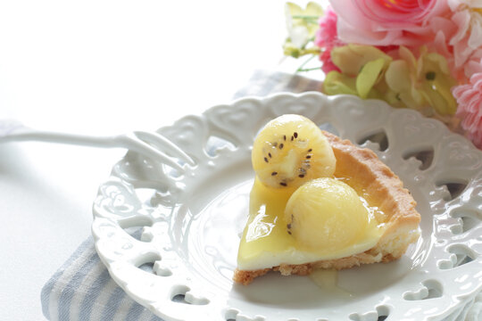 Piece of Kiwi fruit  and tart for dessert image 
