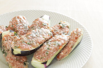 Prepared eggplant stuffed with  herbal minced pork for asian cooking image