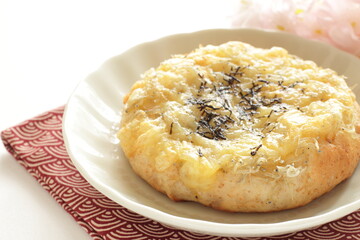 Japanese dried small fishes and seaweed with cheese bread