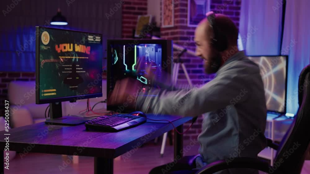 Aufkleber gamer playing fast paced space shooter simulation screaming victorious at the computer screen after 