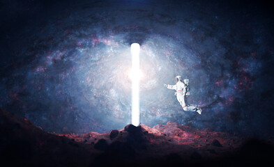 Obraz premium Astronaut on alien planet entering spacetime portal light