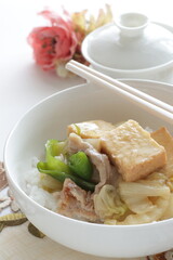 Chinese food, braised Tofu and pork with Chinese cabbage on rice