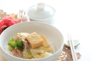 Chinese food, braised Tofu and pork with Chinese cabbage on rice