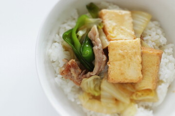 Chinese food, braised Tofu and pork with Chinese cabbage on rice