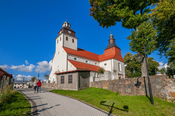 Fototapeta premium Wiele - village in Pomeranian Voivodeship, Poland. St. Nicholas Church.