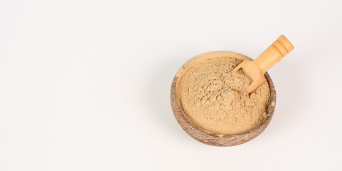 Healing earth powder in a bowl, supplement and antioxidant for to detox the body, alternative medicine
