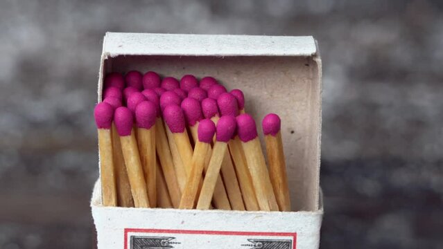 Pack of red matches close up