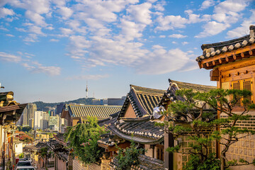 Fototapeta na wymiar Bukchon Hanok Village with Seoul city skyline, cityscape of South Korea