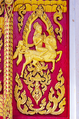 Obraz premium Traditional Thai style wood craving in Thai temple