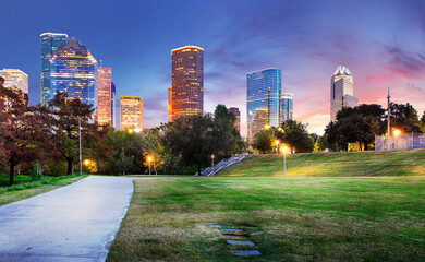 Obraz premium Houston Texas Skyline with modern skyscrapers and blue sky view from park river US