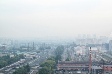 Moscow district under smog smoke from forest fires in Ryazan, Russia. Wildfire haze worst ecologic...
