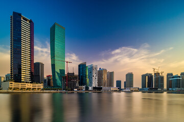 Fototapeta na wymiar Long exposure photo of the Dubai Business Bay area