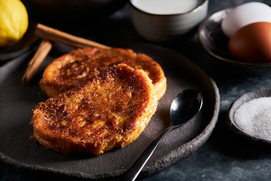 Raw ingredients of torrija placed on table