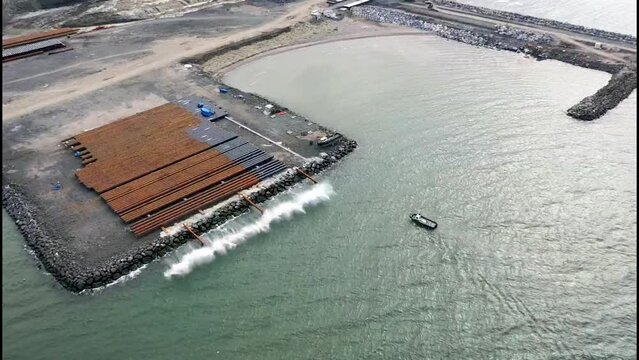 rolling stel pile to the sea -1 