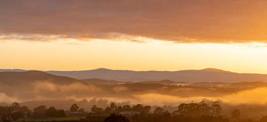 Misty sunrise over the mountains