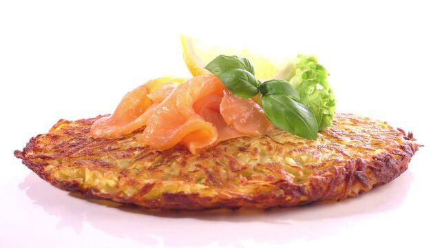 Smoked Salmon - Fish Plate with Potato Pancake isolated on white Background