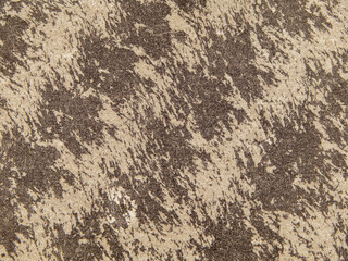 Brown-yellow background texture. Patterned surface of the paper background. Elegant speckled background. Decorative paper