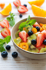 Healthy fresh fruit salad in a bowl