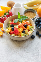 Healthy fresh fruit salad in a bowl