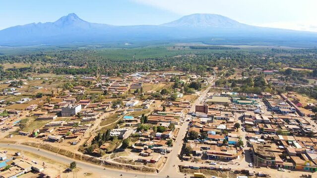 Mount kilimanjaro view . Small settlement of houses with Kilimanjaro background. Kilimanjaro Africa kenya Oloitokitok area.