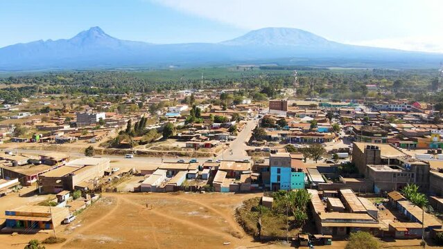 Mount kilimanjaro view . Small settlement of houses with Kilimanjaro background. Kilimanjaro Africa kenya Oloitokitok area.