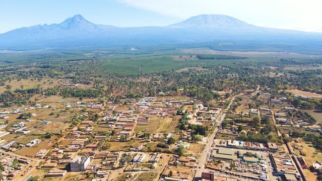 Mount kilimanjaro view . Small settlement of houses with Kilimanjaro background. Kilimanjaro Africa kenya Oloitokitok area.