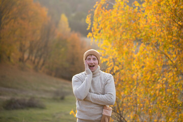 Man in the autumn forest