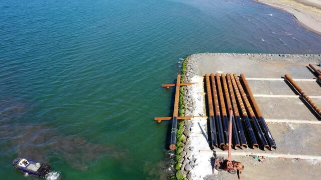 rolling stel pile to the sea -3
