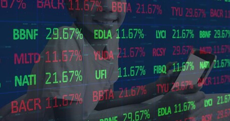 Animation of stock market over african american boy using tablet - Powered by Adobe