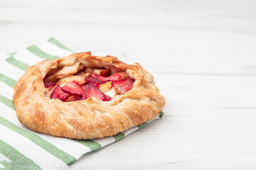 Step by step recipe galette or pie with strawberry. recipe for making biscuits, sweet pastries. Top view with copy space.