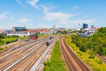 Fototapeta na wymiar Train Tracks and Yard near the Central Station of Aarhus, Denmark on summer day. Aarhus is the second-largest city of Denmark.