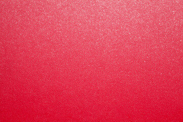 Sheet of red iridescent paper texture background