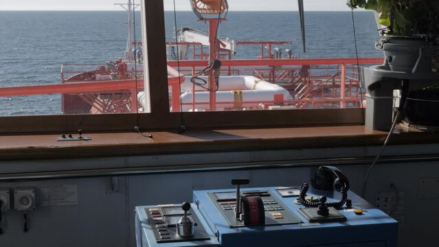 Control panel on navigation bridge of LNG tanker ship