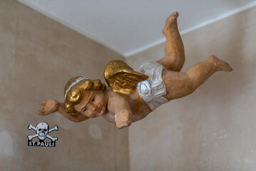 Flying putto brings love to St.Pauli. Since ancient times until the present, putti have often...