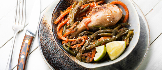 Chicken legs stewed with spices and vegetables.