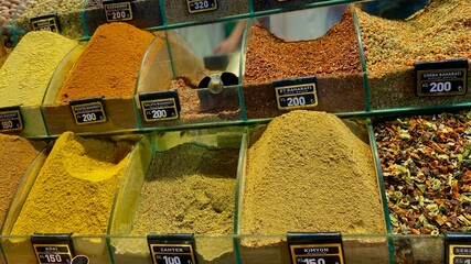Colorful spices in bazaar. Herbals Misir carsisi eminonu Turkey. Aromatic spice in bazaar...