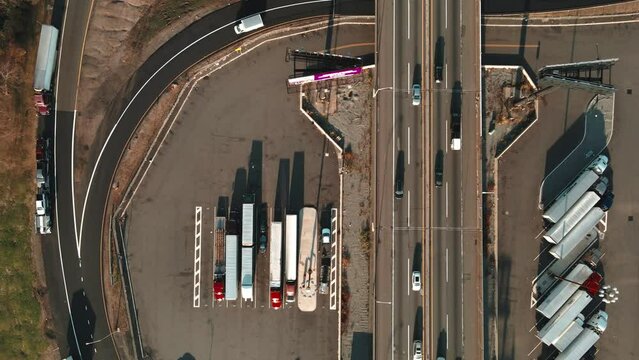 truck drivers parked parked at the service plaza between New York and New Jersey on I 95 aerial footage 4k bird eye view