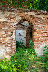 Fototapeta na wymiar A beautiful medieval old ruined palace. Ancient red brick ruins