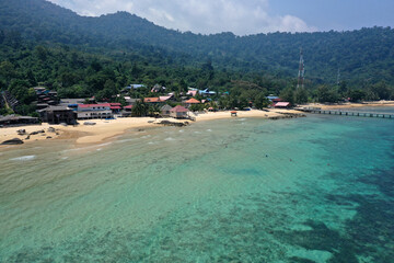 Fototapeta na wymiar Tioman tropical island drone photo with beautiful blue sea and sky. South China sea. Southeast Asia
