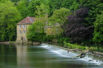 Fototapeta na wymiar Fulling Mill in Durham using a long exposure 