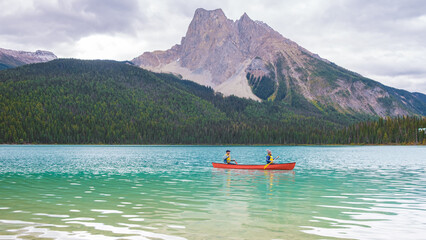 Emerald Lake in Autumn at the Yoho National Park Alberta Canada, men by the Emerald lake Canada....