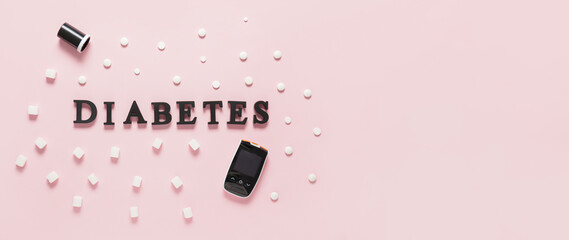 Word DIABETES, glucometer, sugar and pills on light background with space for text