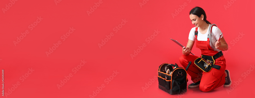 Poster female plumber with tools and bag on red background with space for text