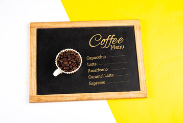 Coffee menu design on isolated slate with coffee beans