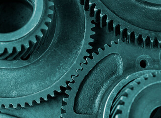 Closeup view of industrial gears - teamwork concept