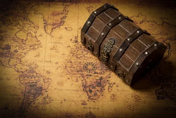 Fotobehang Secret treasure box with vintage world map - treasure hunt concept © stockyme