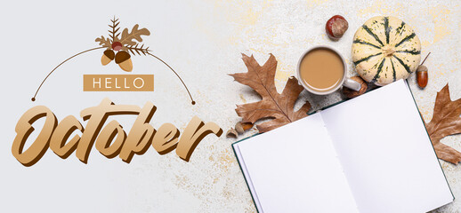 Text HELLO OCTOBER with cup of coffee, book and autumn decor on light background
