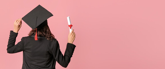 Female graduating student with diploma on pink background with space for text, back view