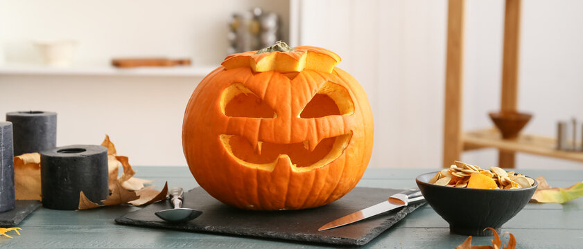 Carved Halloween Pumpkin On Table