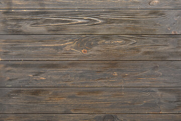 Fototapeta premium Dark wooden boards as background